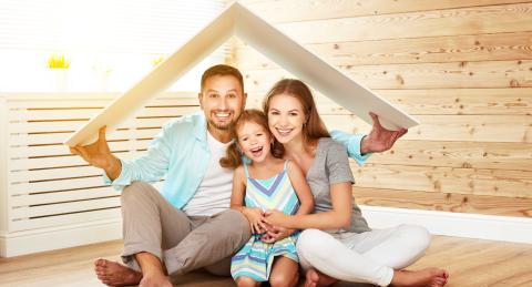 Young family under a makeshift home