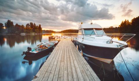 Boat by the dock at sunset