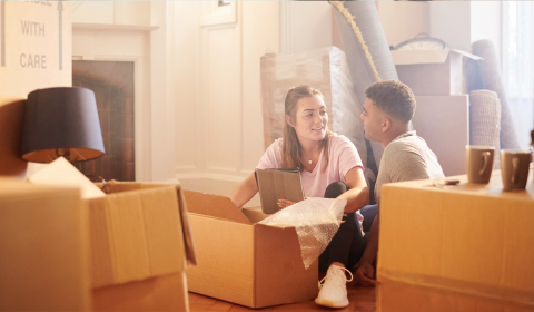 Young couple moving into first home