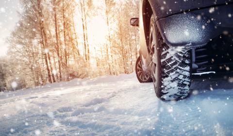 Winter tires on car in snow