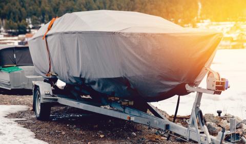 stored boat in tarp