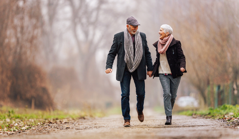 retired couple walking 