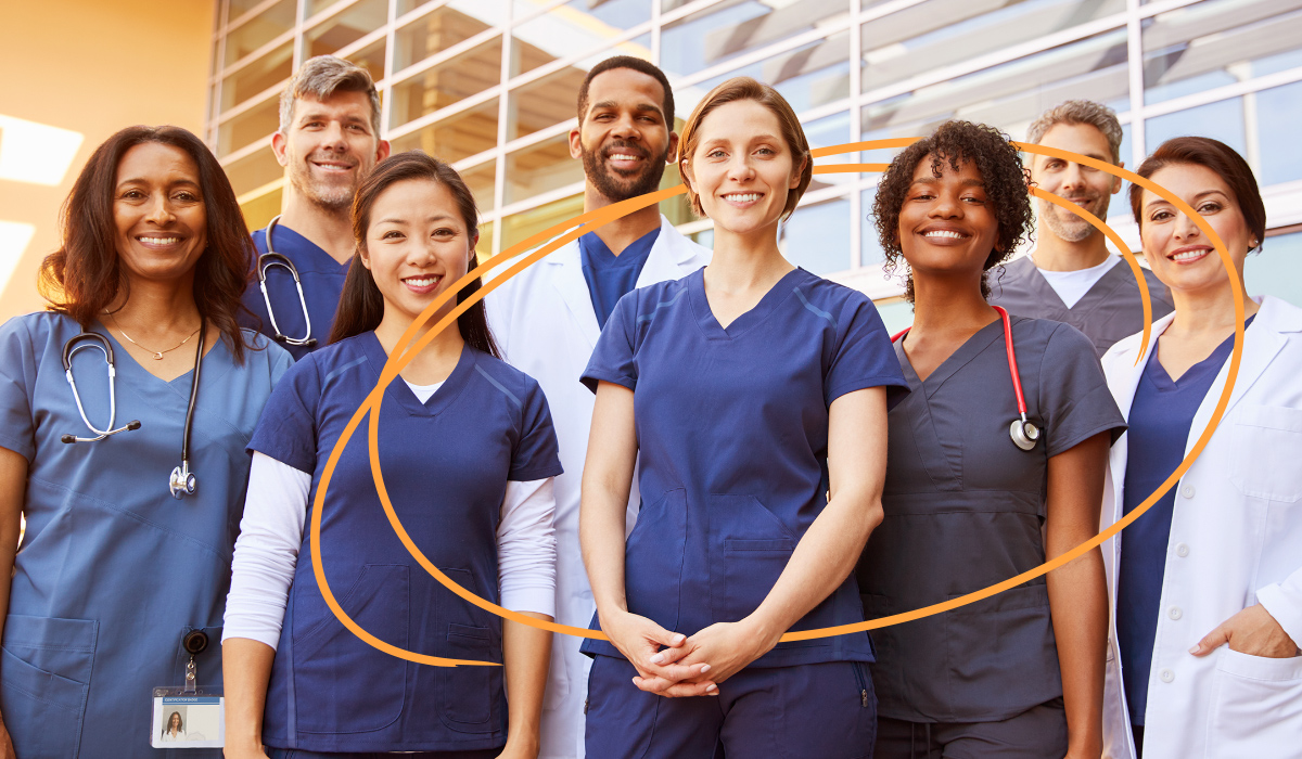 Portrait of medical team standing in a doctor’s office.